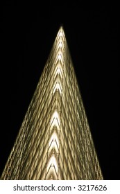 Futuristic Skyscraper Facade at Night
