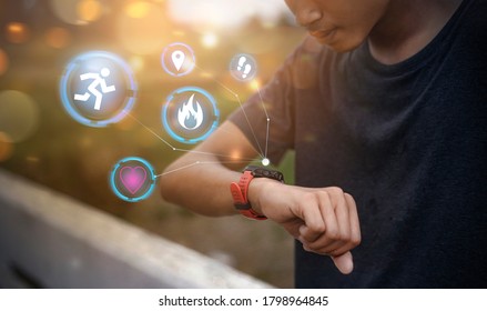 Futuristic Smart Watch Technology Male Looking At Watch Checking Running Distance Heart Rate After Running Jogging And Exercising Fitness Health Tracking Fit Lifestyle, Holographic Icon User Interface