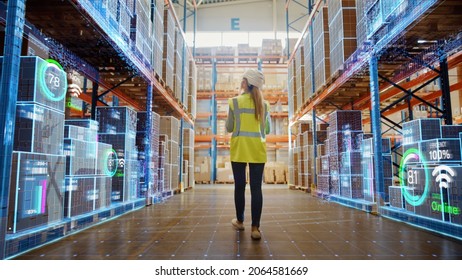 Futuristic Technology Retail Warehouse: Worker Doing Inventory Walks when Digitalization Process Analyzes Goods, Cardboard Boxes, Products with Delivery Infographics in Logistics, Distribution Center