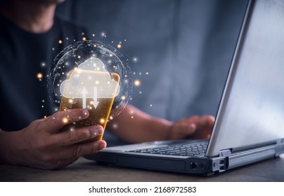 Futuristic technology transformation concept, Business man using smartphone and laptop computer connect to cloud for transfer data, Global internet network, cloud computing storage system. - Shutterstock ID 2168972583
