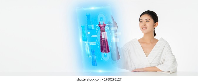 Futuristic technology,smart lifestyle and 5G internet concept.Woman try to use  hologram display with virtual augmented reality for choose select color of cloths after taking shower.