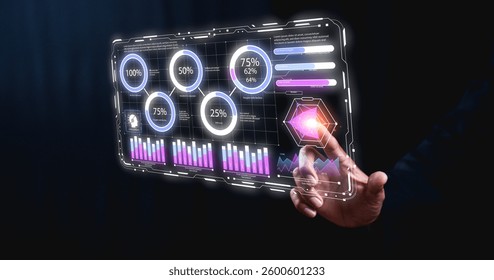 A futuristic touchscreen interface displaying various data metrics and analytics, with vibrant graphs and circular indicators, set against a dark background. - Powered by Shutterstock - Get 15% off with code: PIKWIZARD15