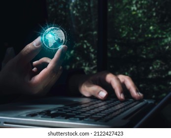 A Futuristic Virtual Small Blue Planet In Hand, Digital Link Tech While Using A Laptop Computer On Dark. Future Global Network Connection And Big Data Analytics And Business Intelligence Concept.