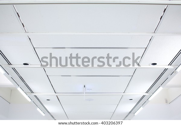 futuristic white office\
ceiling