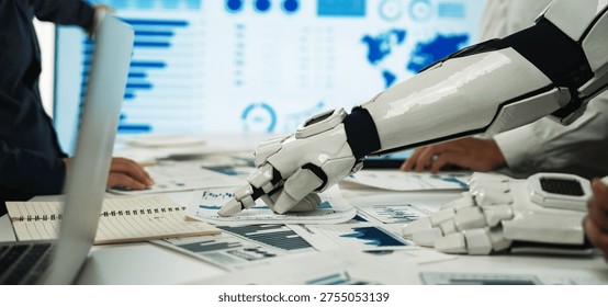 A futuristic work scene featuring a robotic arm collaborating with human colleagues in a data analysis meeting, showcasing advanced technology in a professional setting.Noogenesis