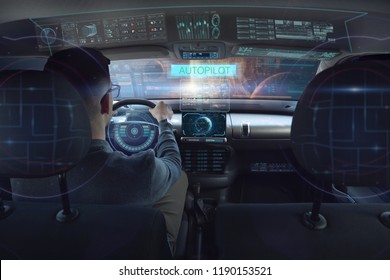 In A Futuristic World A Person Drives A Car Of The Future With Holographic Technology And Augmented Reality, Concept Of Transportation And Immersive Technology Linked To Travel,  Cars WithAutopilot 