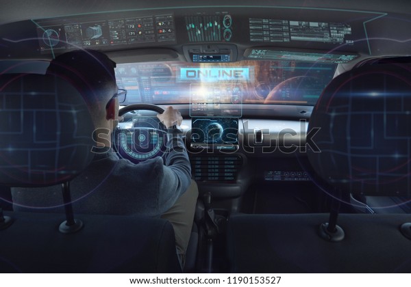 in a futuristic world a person drives a\
car of the future with holographic technology and augmented\
reality, concept of transportation and immersive technology linked\
to travel,  cars with Autopilot\

