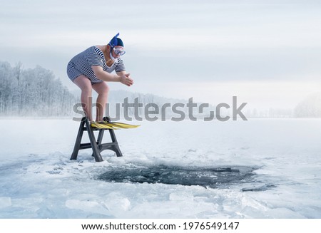 Fuunny overweight, retro swimmer about to jump into ice hole in the lake, with copy space 
