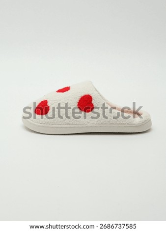 Fuzzy Heart Pattern Slippers on a gray background