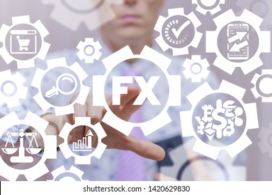 FX Foreign Exchange Market Financial Concept. Businessman Uses On A Virtual Screen Of The Future And Touches The Acronym: FX.