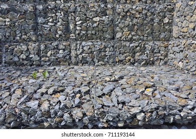 Gabion - Stones In Wire Mesh. Popular Element Of Design For  Garden Landscaping And Erosion Control