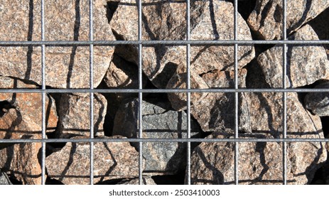 Gabion, texture, background. Gabion net and construction design. New technologies in arranging terraces on a personal plot. Modern decorative elements of landscape design