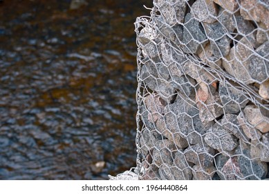 Gabion Wall Constructed Using Steel Wire Mesh Basket. Stone Walls, Gabion Revetment - Protection From Backshore Erosion. Gabion And Rock Armour - Coastal And Waterways Protection.