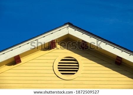 Similar – Image, Stock Photo Yellow house gable and windowless rear of a house with gutter and downpipe