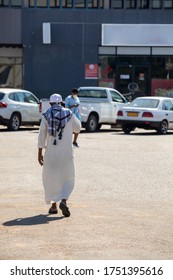 In Gaborone, A Muslim Older Man Walking In The Streets