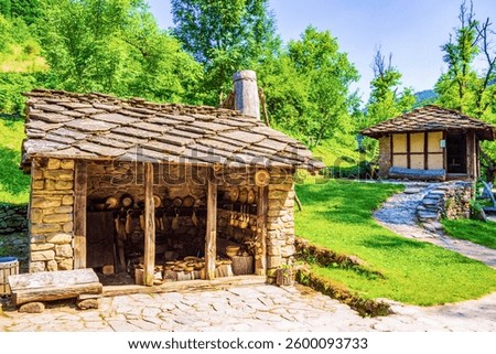 Gabrovo,Etara,Bulgaria-July 7th 2015: outdoor museum to desplay the architecture and lifestyle of Gabrovo region Street of Balkan buildings with traditional crafts demos, plus historical water mills
