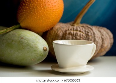 Gac fruit, Pumpkin,coffee cup and Winter Melon with still life.