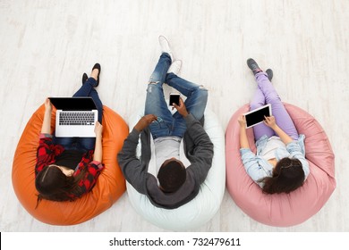 Gadgets And Technology. Diverse People Using Smart Devices, Students Preparing For Exam At Campus, Top View