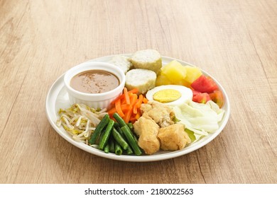 Gado Gado, Indonesian Traditional Vegetable Salad With Peanut Sauce, Rice Cake, Tofu And Egg
