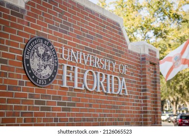 Gainesville, Florida - January 28, 2022: University Of Florida Gators College Campus Entrance Sign With Flag