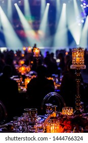 Gala Dinner Event Dinner Decor In Dark Room With Stage Lights And Smoke