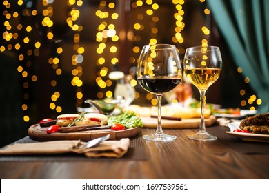 Gala Dinner With A Glass Of Red Wine, Laid Table, Side View, Horizontal