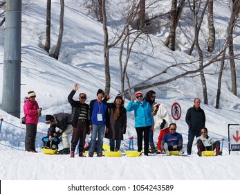 Gala Yuzawa/Japan - March 11 2018:Family Playing On Snow Sledding With Trey Or Snow Rafting At Winter Festival In Gala Yuzawa Ski Resort Japan.