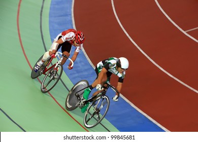 GALAPAGAR, SPAIN APRIL 6 - Cyclists In Full Competition For The Final Races Of The Championship Of Spain For Indoor Track Cycling Teams - Cycle Track Of Galapagar,Spain April 2012