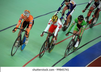 GALAPAGAR, SPAIN APRIL 6 - Cyclists In Full Competition For The Final Races Of The Championship Of Spain For Indoor Track Cycling Teams - Cycle Track Of Galapagar,Spain April 2012