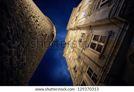 Similar – Schmales Fenster in der Steinmauer mit Blick auf das Pariser Stadtbild