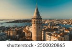 Galata tower. Close-up photo of Galata Tower, one of the few beauties of Istanbul, taken with a drone at sunrise. Magnificent view of the sea and buildings in the background.