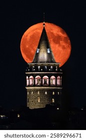 Galata Tower and Full Moon in Istanbul City, Turkiye