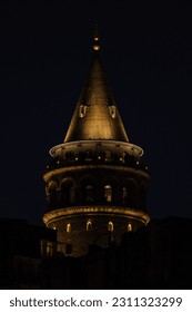 Galata Tower night exterior view background with gold yellow light.  - Shutterstock ID 2311323299