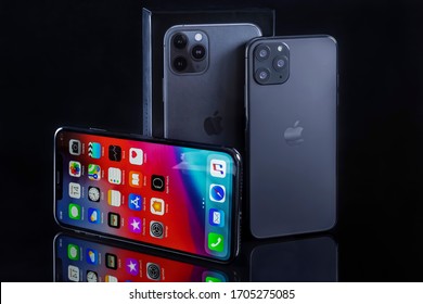 Galati, Romania - March 23, 2020: Apple launch the new smartphone iPhone 11 Pro and iPhone XS Max. iPhone Xs Max front view and iPhone 11 Pro back view on black background.