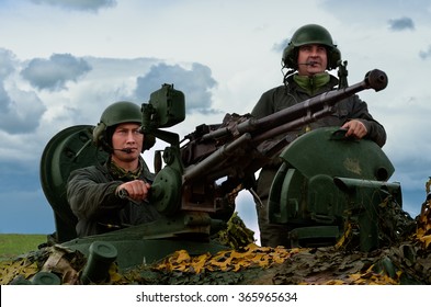 GALATI, ROMANIA - OCTOBER 8:Roman military with 12.7mm caliber machine gun on the tank TR85M1 in Romanian military polygon in the exercise Smardan Danube Express 14 on Galati, Romania, 2014

