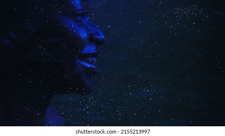 Galaxy Inspiration. Astrology Science. Neon Blue Side View Silhouette Of Smiling Woman Face On Dark Cosmic Dust Star Night Sky Empty Space Background.