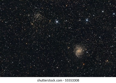 Galaxy and open star cluster - Powered by Shutterstock