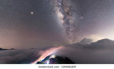 Galaxy over the sea of cloud - Shutterstock ID 1394481839