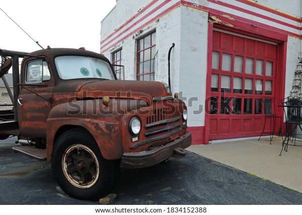Galena,\
Kansas - Oct. 5, 2019: This vintage boom truck parked at a former\
service station on Route 66 in Galena was the inspiration for the\
character Tow Mater in the animated Cars\
movies.