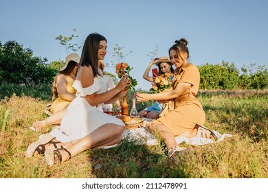 Galentines Day. Slumber Party. Summer Picnic Party Ideas, Outdoor Gathering With Friends. Young Women Girl Friends Drinking Wine, Laughing, Having Fun Together At Picnic.