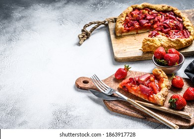 Galette Tart With Strawberry And Rhubarb. Homemade Tarte. White Background. Top View. Copy Space