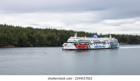 Galiano Island, British Columbia, Canada - June 21, 2022: BC Ferries Boat In Pacific Ocean During Cloudy Summer Day.