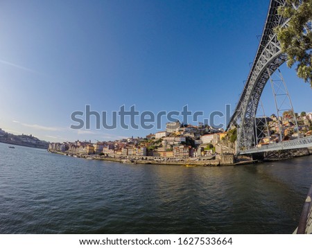 Similar – Blonde woman looks at bridge in Porto