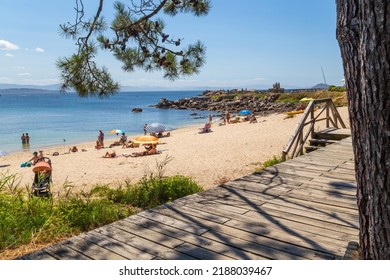 Galicia, Spain - July 27, 2022: People in Galicia beach in a summer day, Galicia. Spain
