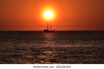 Galleon on the sea by evening