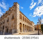 The gallery on the west facade of El Infantado Palace, with a double series of semicircular arches over elliptical pillars. Castilla la Mancha, Guadalajara, Spain.