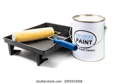 A Gallon Can Of Paint With A Fake, Generic, White Paint Label, With A Yellow Paint Roller And A Black Plastic Paint Tray Isolated On White