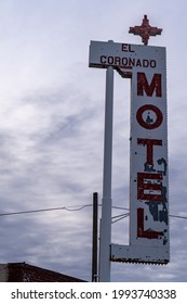 Gallup, New Mexico - May 18, 2021: The abandoned, rusted sign for the El Coronodo Motel, off of Route 66