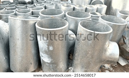 Galvanized T joint pipe. Galvanization is the process of applying a protective zinc coating to steel or iron,to prevent rusting, Copper pipe on white with connector, Copper plumbing pipe leaking water