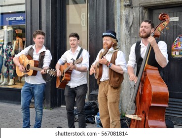GALWAY, IRELAND - MAY 2016: Buskers performing music on the streets of Galway